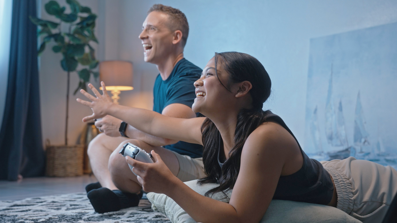 Father-and-teen-playing-video-games